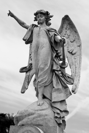 Angel pointing towards heavenの写真素材