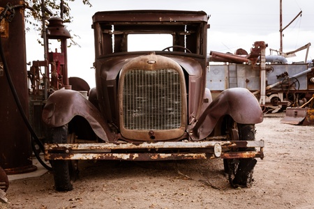 This old abandoned car has seen better days.の写真素材
