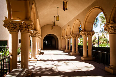 Close up view of ornate arches and walkway in Balboa Park, San Diego.