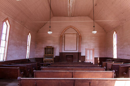 Sunlit shot of interior of a wooden church.のeditorial素材