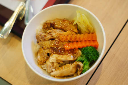 Chicken teriyaki with steamed rice の写真素材