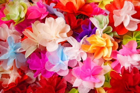 Colorful artificial flowers backgroundの写真素材