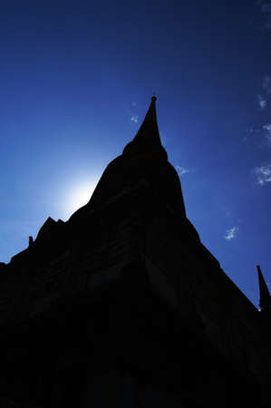 Silhouette of big ancient pagoda at wat yai chaimongkol,Ayutthaya, Thailandの写真素材