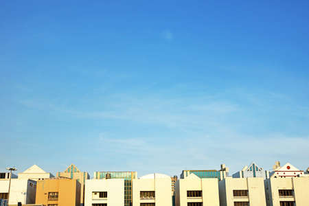 A group of office building against blue sky