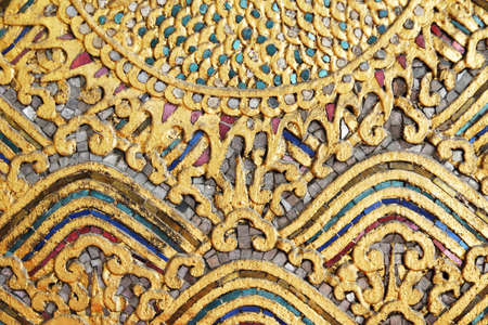 Pattern in traditional Thai style art painting on door of the ancient temple - Wat Mahanpharam ,Bangkok,Thailand の写真素材