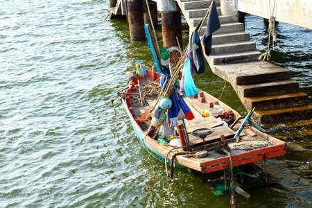 Wooden fishing boat near the port - Thailandの写真素材