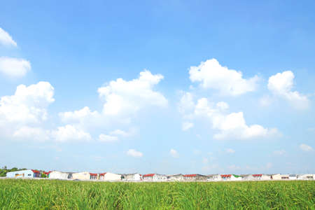 Group of townhouse under cloudy sky in the countryside  の写真素材