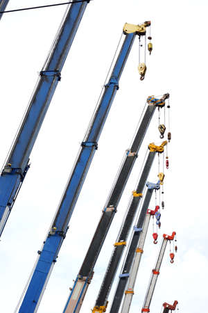 Mobile cranes on white backgroundの写真素材