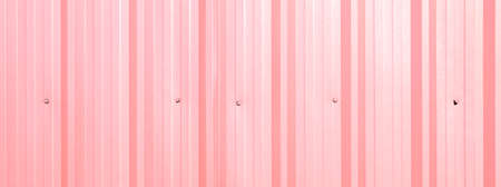 Corrugated sheet as background  pink colorの写真素材