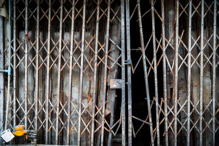 Rusty sliding metal door of abandon house - Retro styleの写真素材