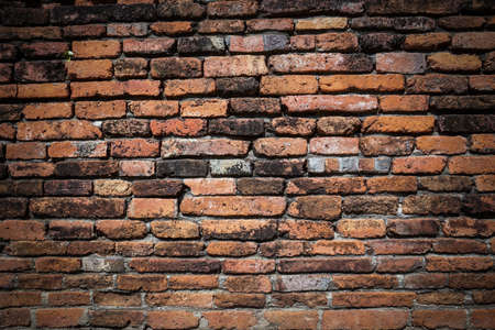 Old grunge brick wall backgroundの写真素材