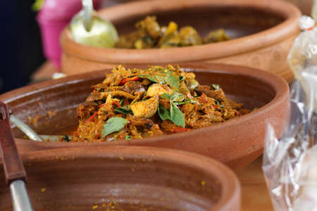 Spicy Thai Curry for sale in the food market - Thai Cuisineの写真素材