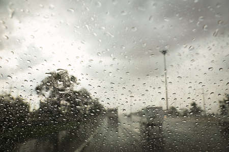 Rain during driving on the road - Background and Scene