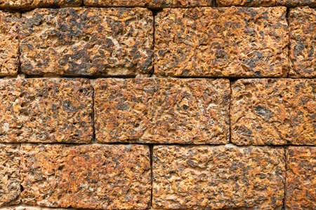 laterite stone brick wall backgroundの写真素材