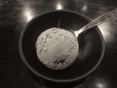 one scoope ice cream ball in bowl - black and white