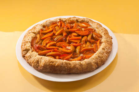 food series: tasty sliced apricot cake on the plateの写真素材