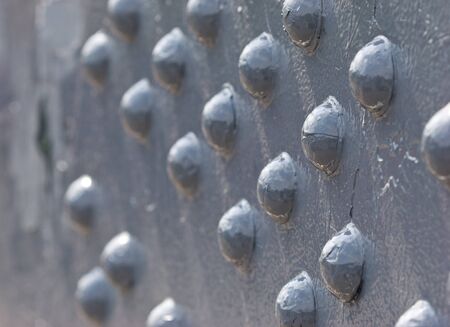 texture series: blue color painted steel rivetの写真素材