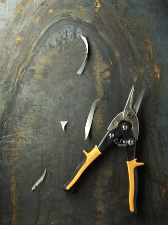 modern metal shears on the steel plateの写真素材