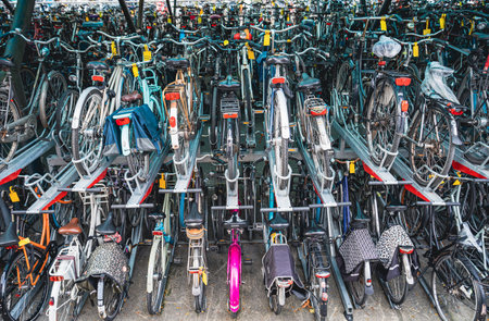 Bicycles parking in a row in Leiden, Holland, Netherlandsの写真素材