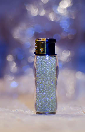 a lighter on blue magical backgroundの写真素材