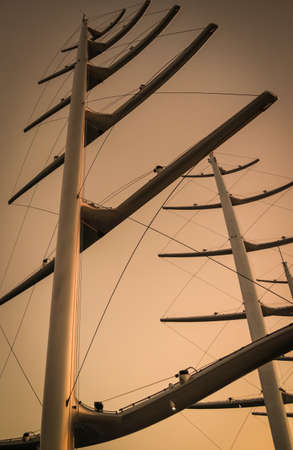 Masts like herringbone on a luxury Yacht.