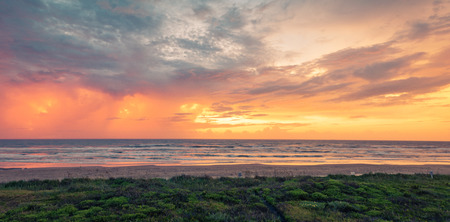 Panoramic Sunrise at beach in Texasの写真素材