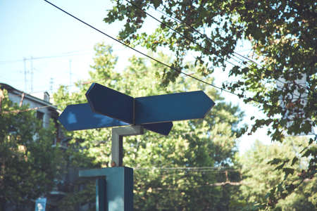 street sign under the sky