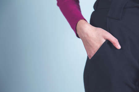 woman hand on the pocketの写真素材