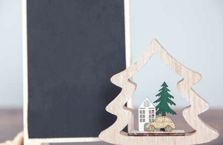 Christmas tree decoration with chalkboard on deskの写真素材