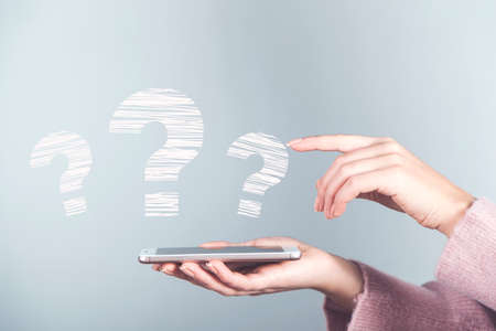 hand phone with question mark in screen