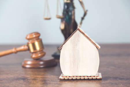 house model with judge and justice lady on deskの写真素材