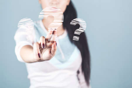 woman touching in screen on gray background