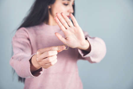 young sad woman hand stop sign in ringの写真素材