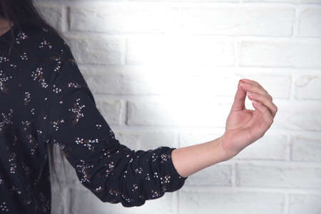 meditation woman on brick wall background