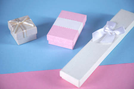 pink and white gift boxes on the tableの写真素材