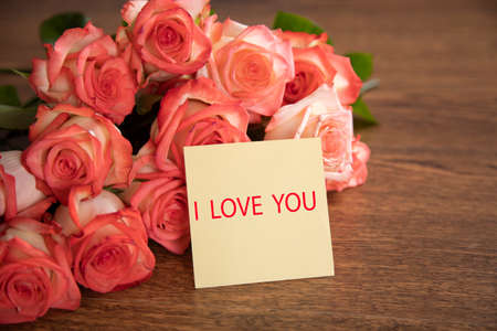 I love you text with roses on the table