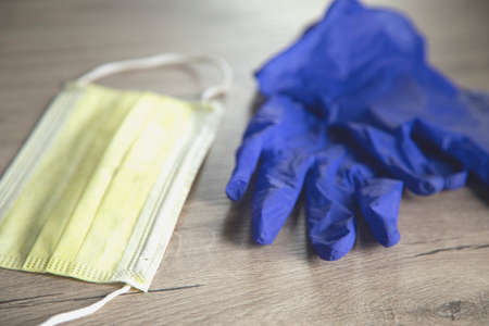 medical mask  and glove on the table