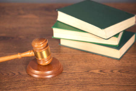 judge and book on the wooden tableの写真素材