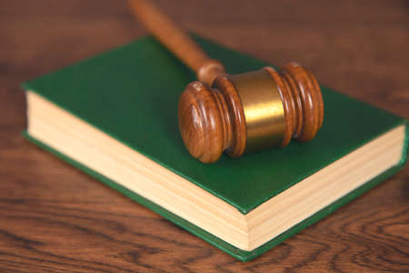 judge on book on the table background