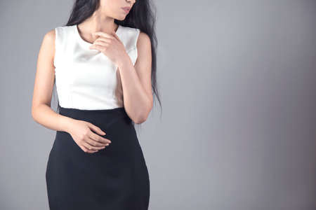 young beautiful fashion woman in studio background