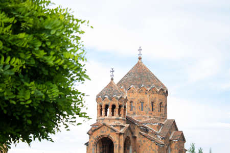 green tree and beautiful church in Armeniaの写真素材