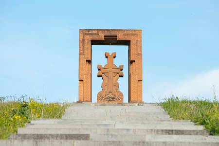 cross in mountain under blue sky backgroundの写真素材