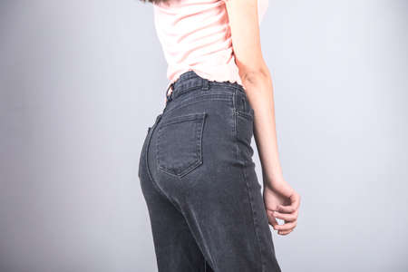 young sexy woman in the studio backgroundの写真素材