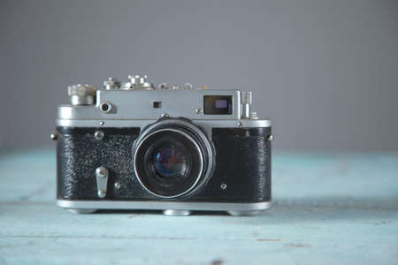 vintage camera on the blue table background