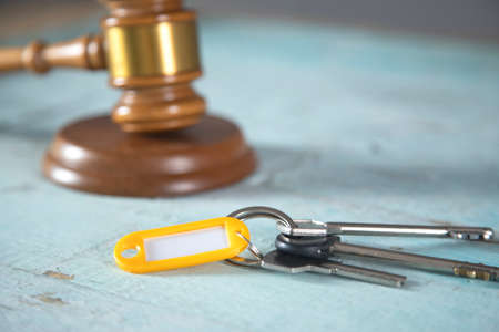 house key and judge on the table