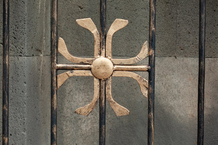 the iron cross in the church gateの写真素材