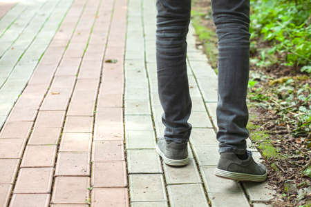 man is walking in the park backgroundの写真素材