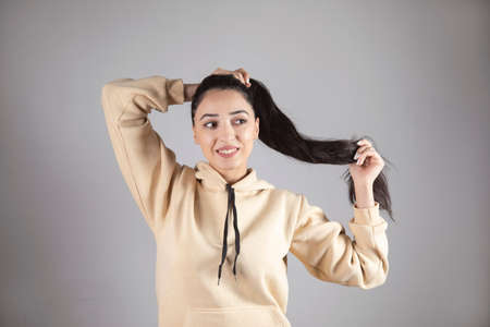 the young woman tails the long hair