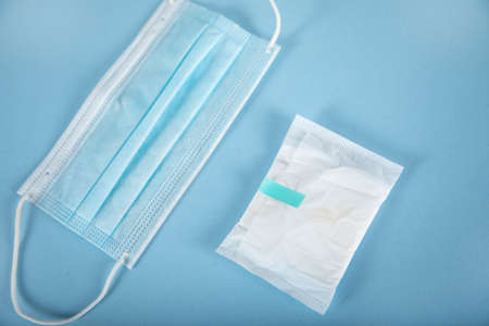 medical mask and pad on the tableの写真素材