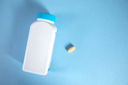 drugs on the blue table backgroundの写真素材